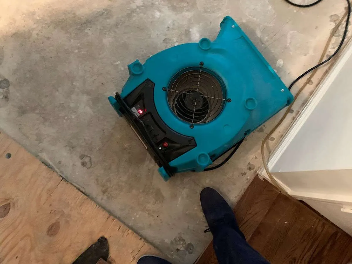 Air mover drying subfloor during Leak Detection & Repair in Yorba Linda